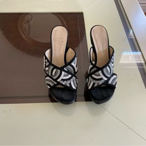 Black , white , and gray mules